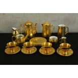 A 1930s Royal Winton for Grimwades gold resist part teaset together with one similar. H.20cm. (