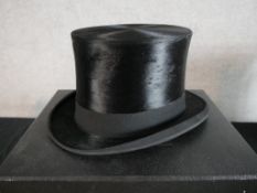 A boxed Lock & Co gentlemen's black silk top hat.