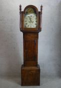 A 19th century Sandon of St. Ives mahogany cased longcase clock, the arched dial with black