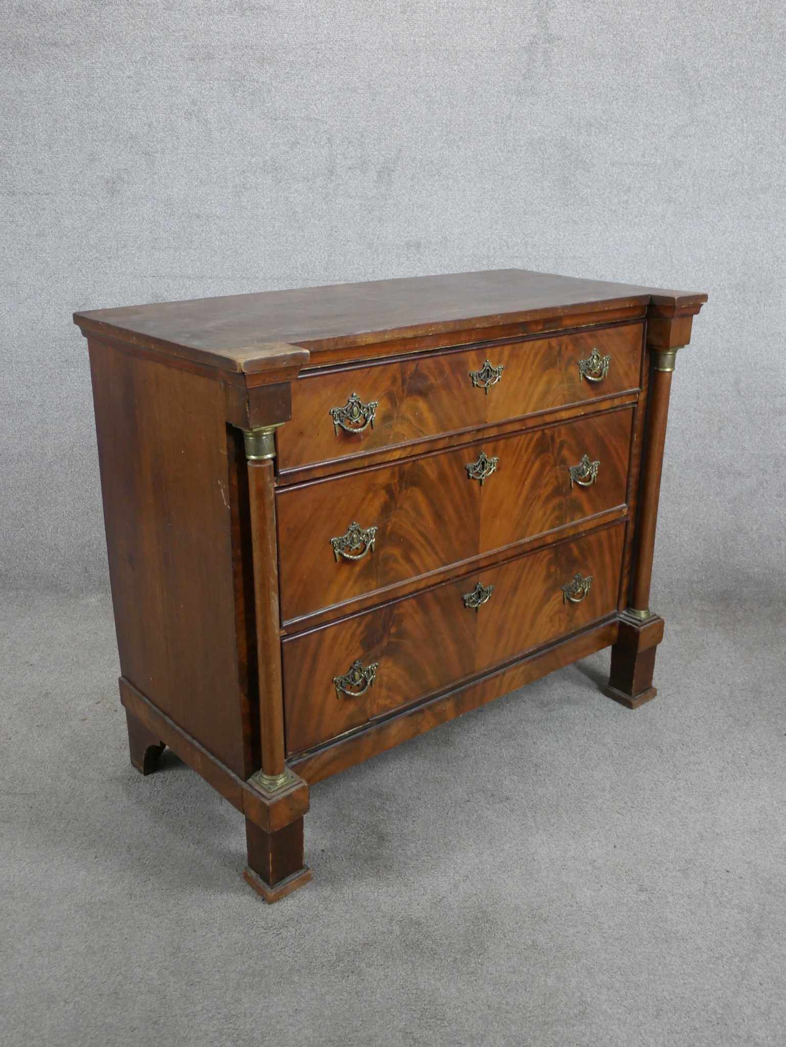 A 19th century mahogany chest of three long drawers, with brass swing handles, turned column - Image 3 of 5