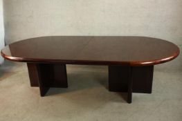 A large vintage extending dining or boardroom table with two extra leaves. H.74 W.158 D.130cm.