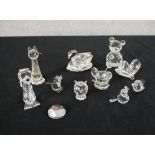 An assortment of Swarovski and other cut glass animals. H.6 W.4 D.4cm largest