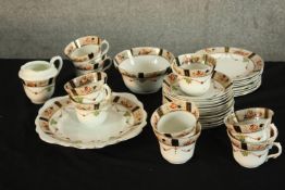 A late 19th century Balmoral China part teaset, to include cups, plates and saucers with floral