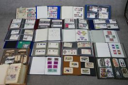 Assorted mainly British 20th century postcards and stamps together with six World War I silk