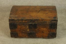 A 19th/early 20th century pine trunk with applied iron work strapwork. H.31 W.57cm.