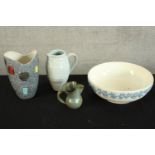 A collection of mixed porcelain to include three jugs and a Wedgewood bowl. largest H.20 cm.