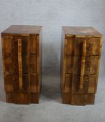 A pair of Art Deco walnut veneered three drawer bedside cabinets each raised on plinth bases. H.76