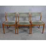 Three 1960s Farstrup Mobler Danish teak and wool dining chairs raised on tapering supports.