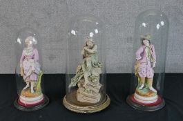 A pair of early 20th century painted porcelain figures, impressed marks to base together with a 20th