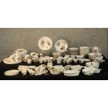 An extensive Royal Worcester Evesham pattern part dinner service to include plates, bowls, lidded