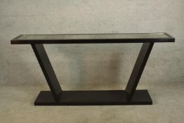 A contemporary metal console table with rectangular mirrored top. H.80 W.136cm.