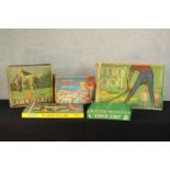 Five 20th century boxed games to include Lawn Darts, Driving Test, Clock Golf, Mini Golf &