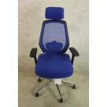 A contemporary blue fabric upholstered adjustable office chair raised on five splayed supports. H.