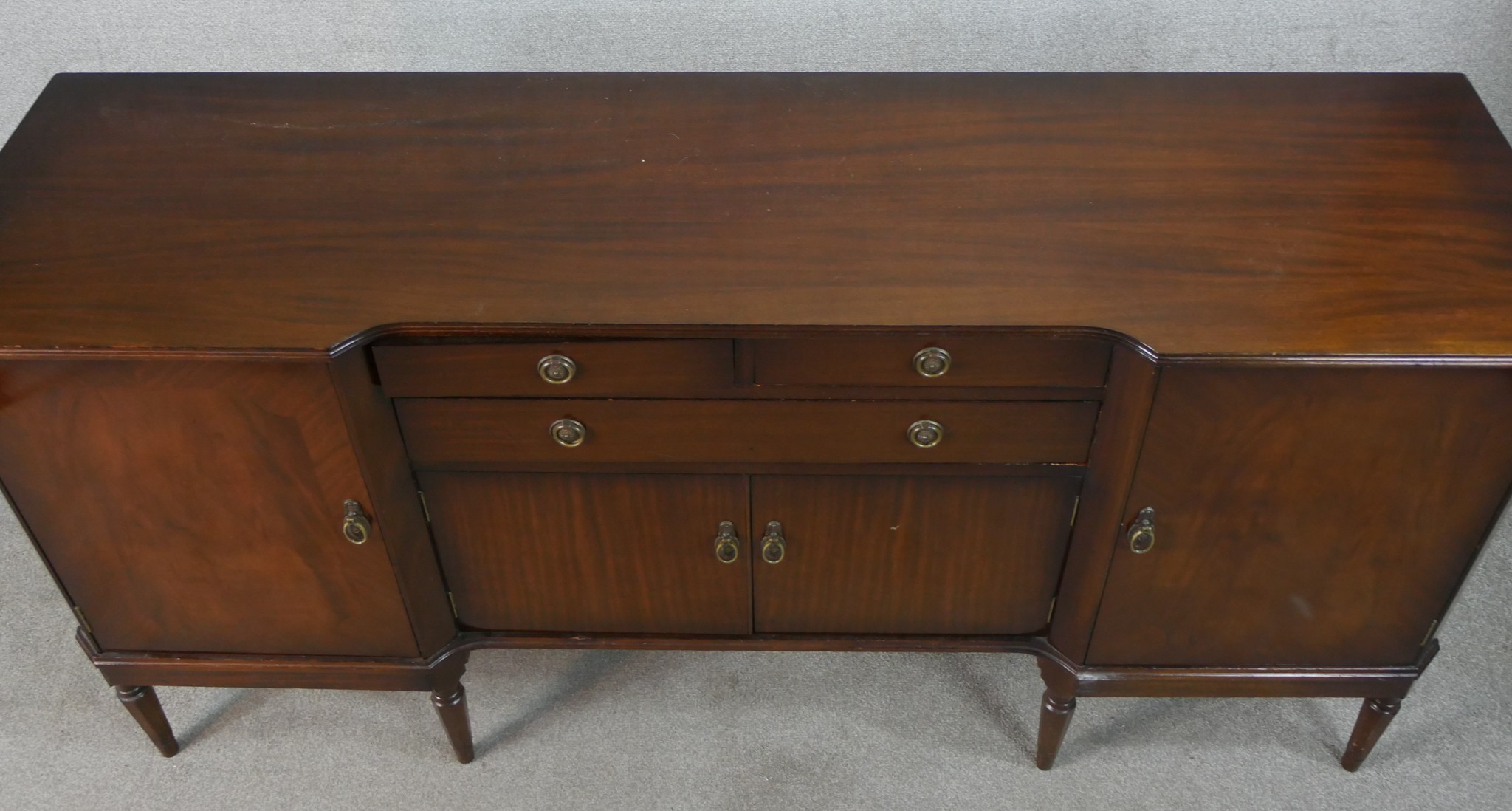 A 20th century Strongbow mahogany inverted breakfront sideboard with two short over single long - Image 4 of 6