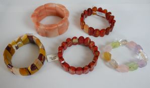 Five elasticated statement gemstone bracelets, including Carnelian, Red Jasper, Agate, Amethyst