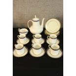 A 20th century Wedgwood Marina pattern part coffee set comprised of six cups, saucers, side