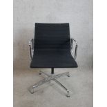Charles Eames for Vitra, a contemporary black leather chrome plated adjustable open arm