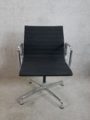 Charles Eames for Vitra, a contemporary black leather chrome plated adjustable open arm