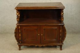A 20th century mahogany French style twin door sideboard raised on turned supports. H.80 W.80 D.
