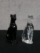 Two 20th century Baccarat crystal seated Egyptian cats, each with applied label. H.16 W.8 D.4cm