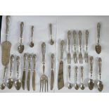 A part canteen of 800 grade silver handled flatware to include spoons, knives and servers. H.26cm