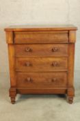 A 19th/early 20th century mahogany Scotch style chest of four drawers with turned knop handles