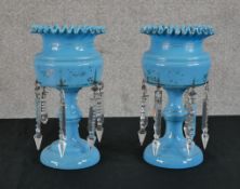 Two late 19th century blue milk glass hanging lustres with clear cut glass prism drops. H.26 W.14