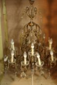 19th century traditions French cage Chandelier. With five arms extending from the stem and eleven