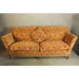A 19th century style upholstered two seater settee. H.86 W.222 D.93cm.