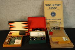 Collection of games. Circa 1960. Including a vintage boxed Indoor Curling set made by Loncraine