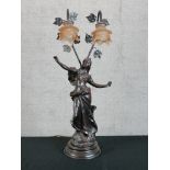 Large Art Nouveau style bronze figural lamp with twin branches. H.79cm.