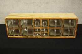 Spice cabinet, vintage pine and moulded glass. H.24 W.76cm.