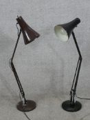 Two anglepoise lamps. Brown and black and both with weighted bases. With labels reading 'Made in