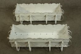 A pair of Victorian style wrought metal white planter boxes. H.26 W.76cm each.