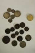 A collection of 20 coins including 19th century Tibetan coins and an Edward VII 1905 penny.