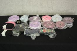 A well preserved collection of ribbon material. Age unknown. Mostly pastel colours but some with