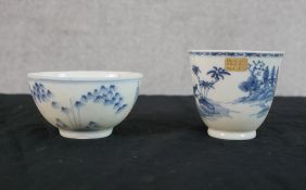 A 19th century Chinese blue and white porcelain bowl with floral decoration, together with an 18th