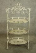 Victorian style decorative metal etagere with three tiered trays. H.105 x W.47 cm.