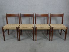 Dining chairs, set of six mid century Danish teak.
