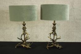 Two modern table lamps decorated with a deer horns design. Both with matching lamp shades. H.