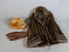 An assortment of ladies fur clothing to include a monk coat, hat and stole, together with a ladies