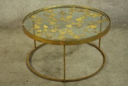 Coffee table, contemporary gilt metal and glass. H.40 Dia.79cm.