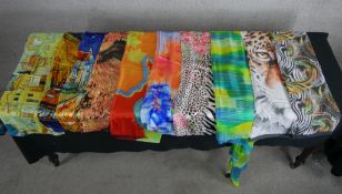 Ten assorted vintage patterned silk scarves.