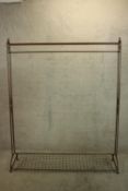 A large Victorian style iron clothing rail measuring H.196 x W.160 cm.
