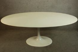 After Eero Saarinen, laminate Tulip dining table. 199 x 121 x 72 cm.
