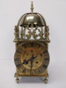 A mid 20th century Smith's brass lantern clock with an 8 day jewelled movement, stamped Smith's Cloc