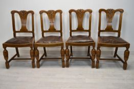 Dining chairs, a set of four mid century oak.