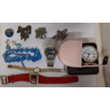 A collection of watches, jewellery and silver brooches. Including a silver and butterfly wing brooch