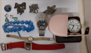 A collection of watches, jewellery and silver brooches. Including a silver and butterfly wing brooch