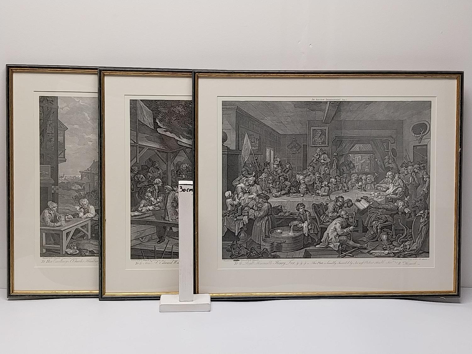 After Willliam Hogarth, three framed and glazed 19th century engravings, 'An election entertainment' - Image 2 of 11